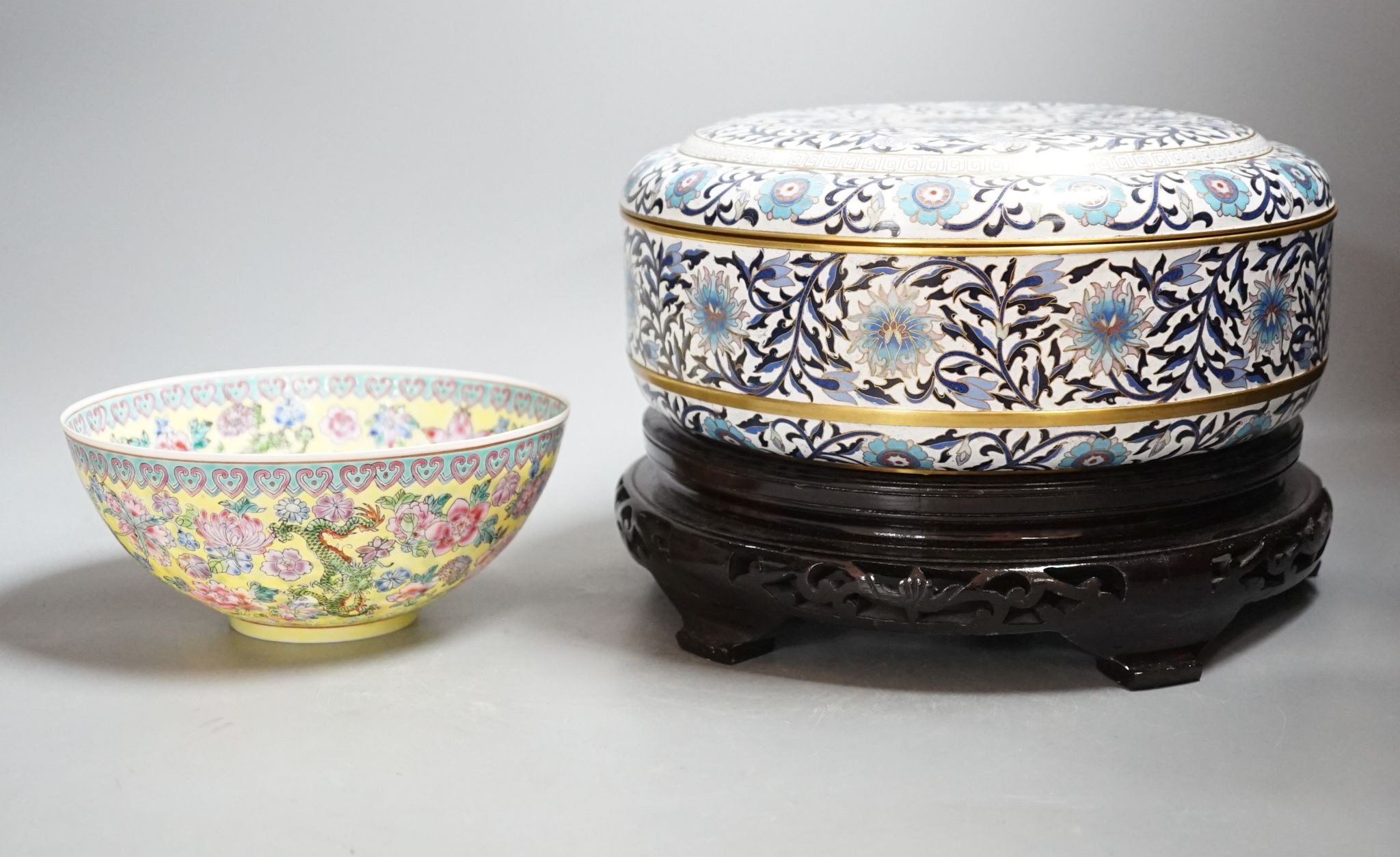 A Chinese cloisonne enamel box and cover, wood stand and a boxed eggshell porcelain bowl